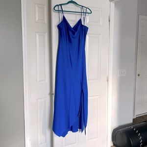 Beautiful satin style  blue dress with slit in the front worn  once size large